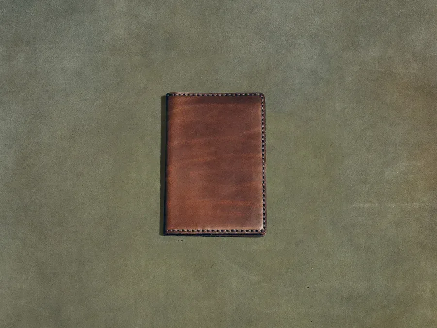 Satchel & Page ChatGPT ad — Expat Wallet - Brown in Travel & Hospitality