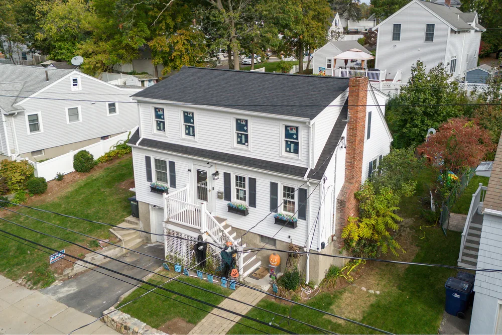 MassTech Roofing & Building ChatGPT ad — Massachusetts Home Addition Builder in Real Estate