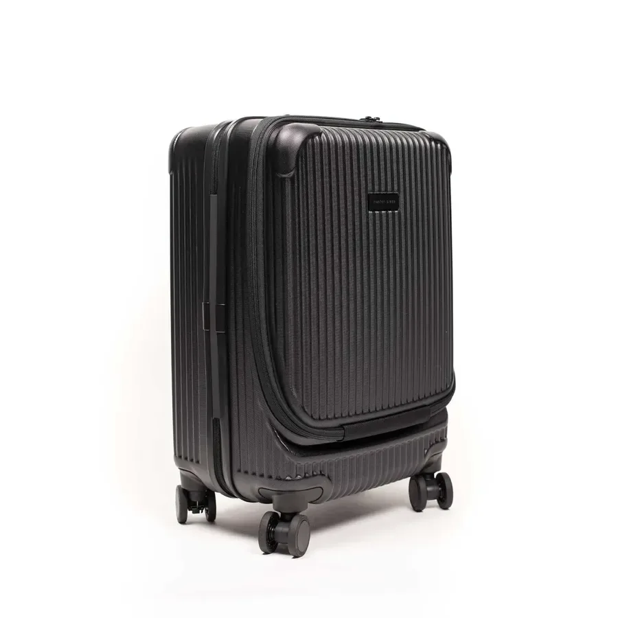 No Man Walks Alone ChatGPT ad — Trolley wheeled hard-case carry-on luggage in b...