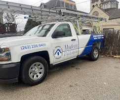 Modern Exterior LLC ChatGPT ad — Free Roof Inspection - Modern Exterior Roofing