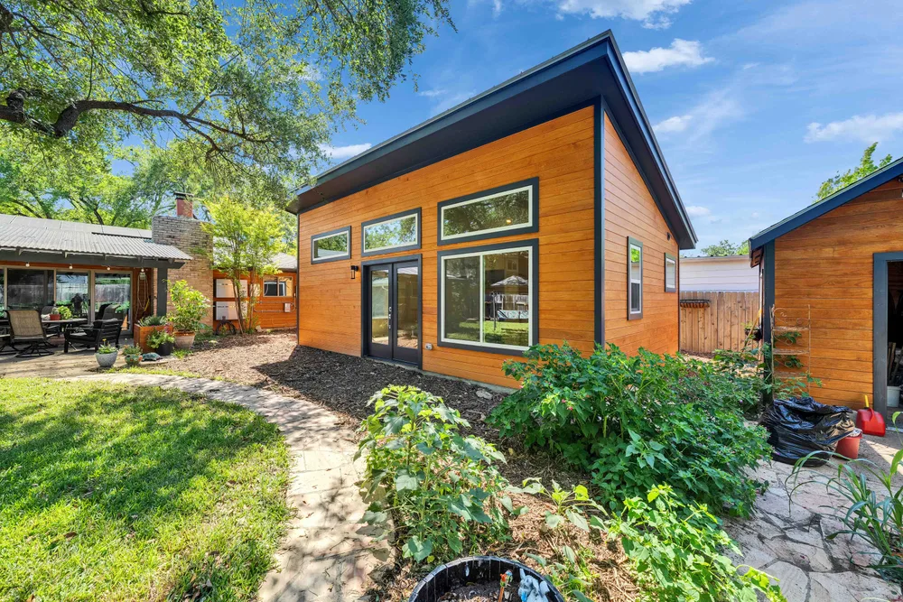 DA Tiny Homes, Inc. dba Austin Tiny Homes ChatGPT ad — Thinking About Building An ADU? in Real Estate