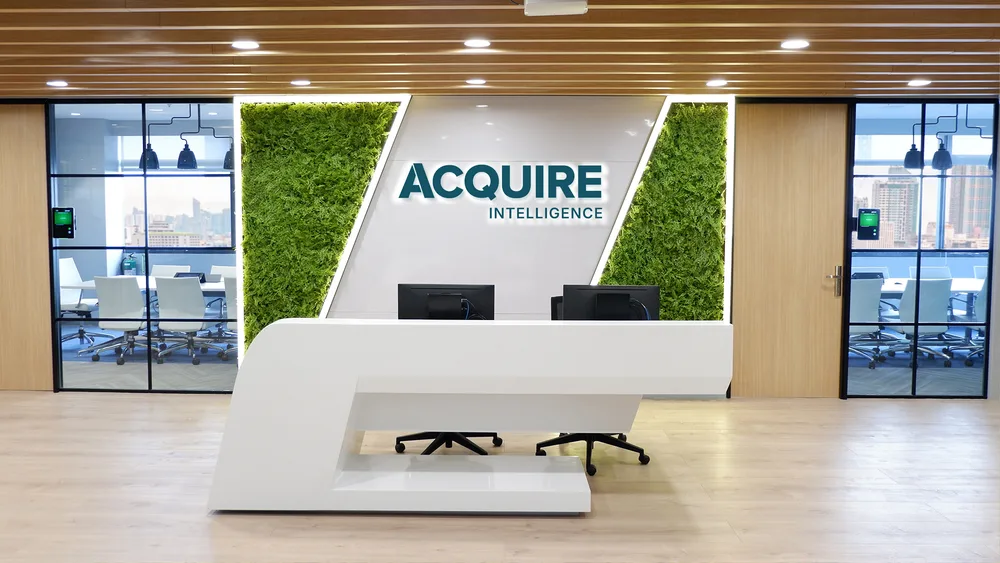 Acquire Intelligence ChatGPT ad — AI That Pays for Itself